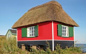 Maison au toit de chaume, typique de l'île de Fionie au Danemark