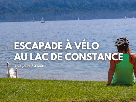 Cycliste se reposant sur les rives du Lac de Constance