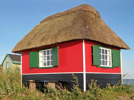 Maison au toit de chaume, typique de l'île de Fionie au Danemark